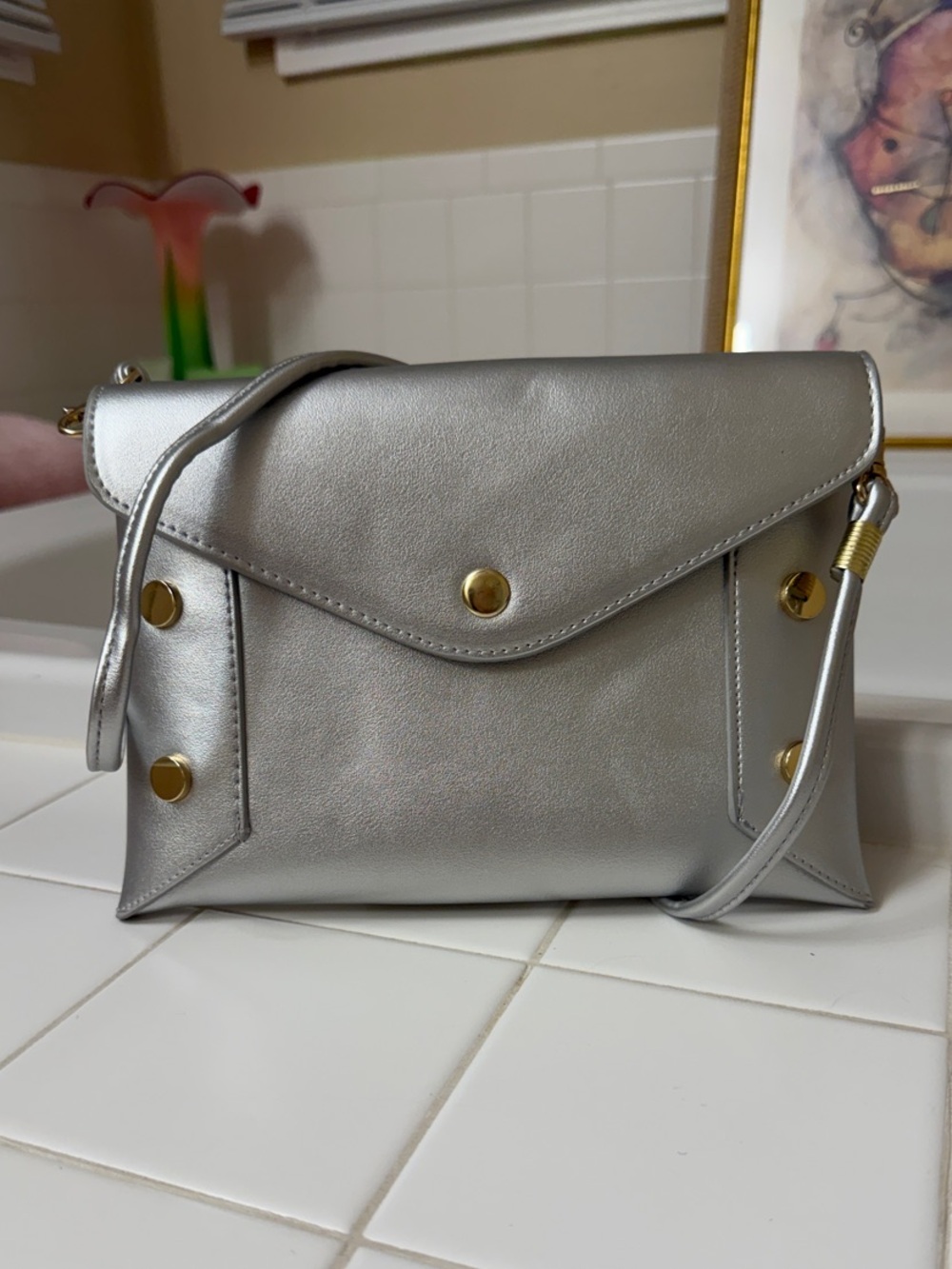 Silver Envelope Crossbody Bag with Gold Accents